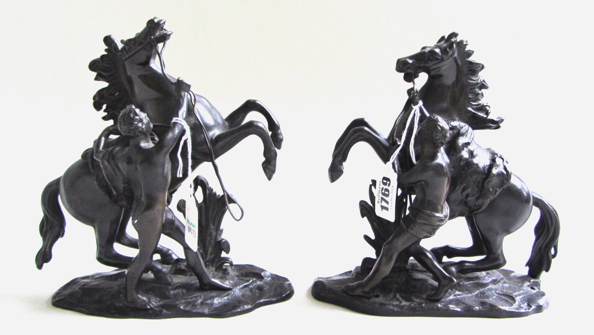 Appraisal: A pair of patinated bronze Marley horses th century of