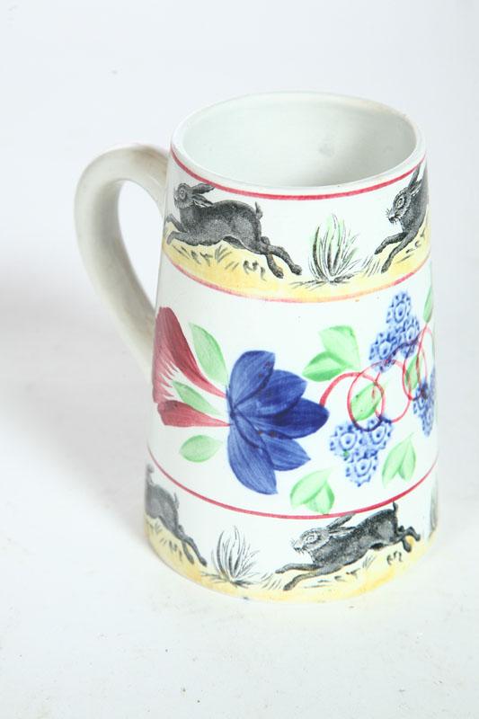 Appraisal: STICK SPATTER MUG England mid th century Gaudy floral stick