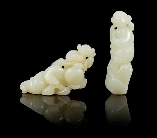 Appraisal: Sale Lot Two Celadon Jade Toggles one depicting a reclining