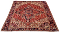 Appraisal: An Antique Heriz Traditional design Heriz with a central geometric