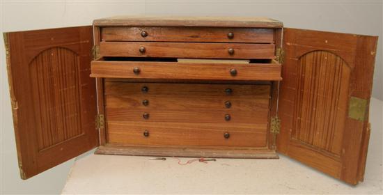 Appraisal: th century collector's mahogany cabinet with two cupboard doors revealing