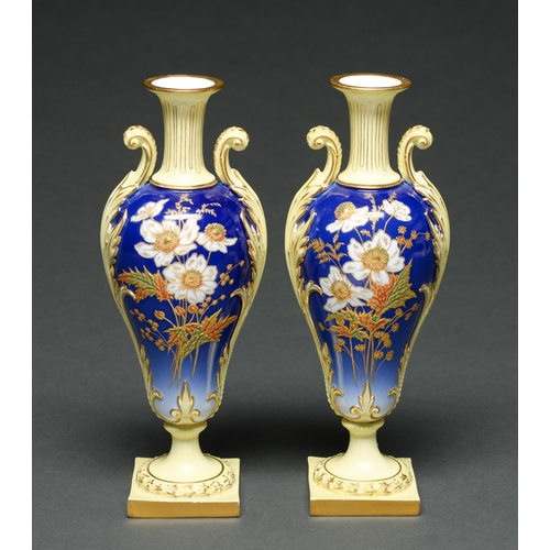 Appraisal: A pair of Royal Worcester yellow ogee vases decorated with