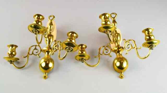 Appraisal: PAIR OF ITALIAN BRASS -ARM SCONCESIncluding two matching -armed brass