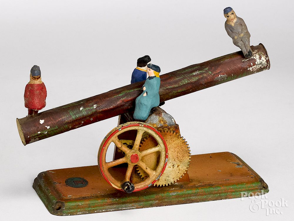 Appraisal: Doll painted tin seesaw log steam toy accessory Doll painted