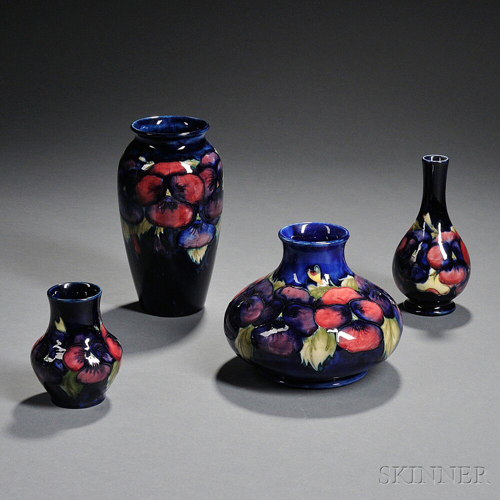 Appraisal: Four Moorcroft Pottery Vases England - All with hand-painted Pansy