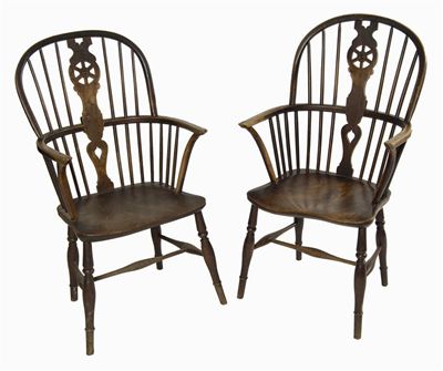 Appraisal: A pair of th century fruitwood and elm Windsor wheelback