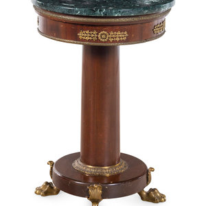 Appraisal: An Empire Style Gilt Metal Mounted Mahogany Marble-Top Side Table