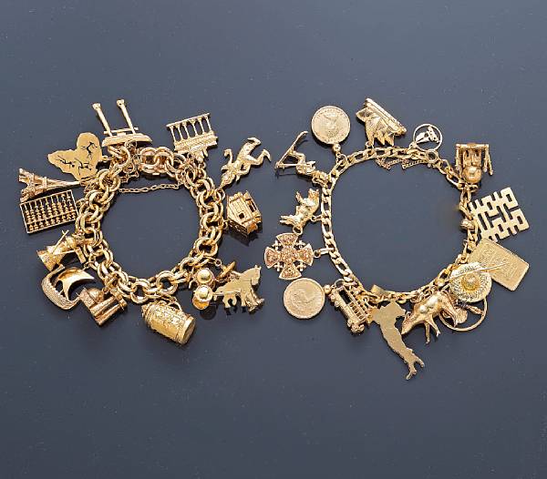 Appraisal: Two fourteen karat gold charm bracelets suspending a total of