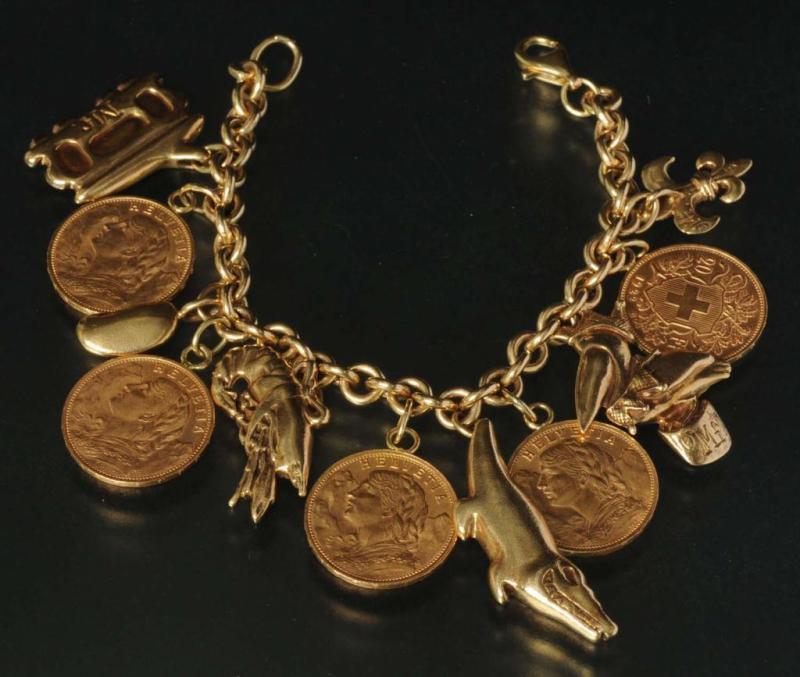 Appraisal: Antique Jewelry Gold Charm Bracelet with Coins Condition Excellent Size