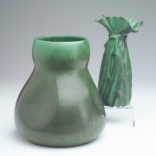 Appraisal: HAMPSHIRE Two vases covered in matte green glaze a large