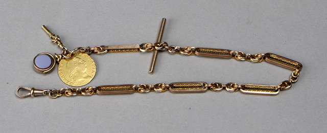 Appraisal: A CT GOLD WATCH CHAIN with trombone links and attached