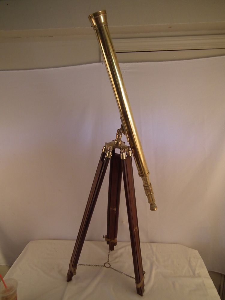 Appraisal: ANTIQUE TELESCOPE ON TRIPOD Old inch long brass telescope on