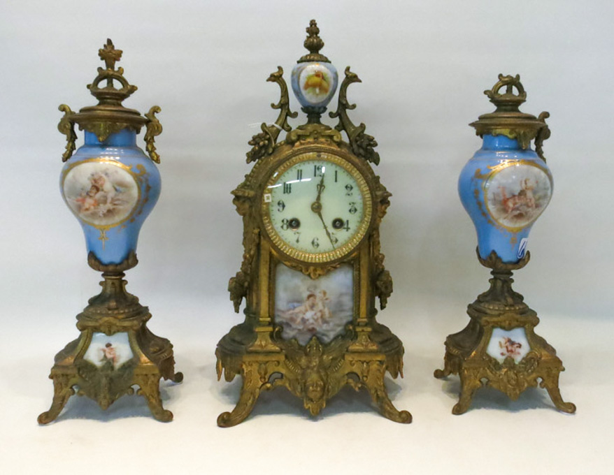 Appraisal: THREE PIECE FRENCH GILT METAL CLOCK SET the set includes