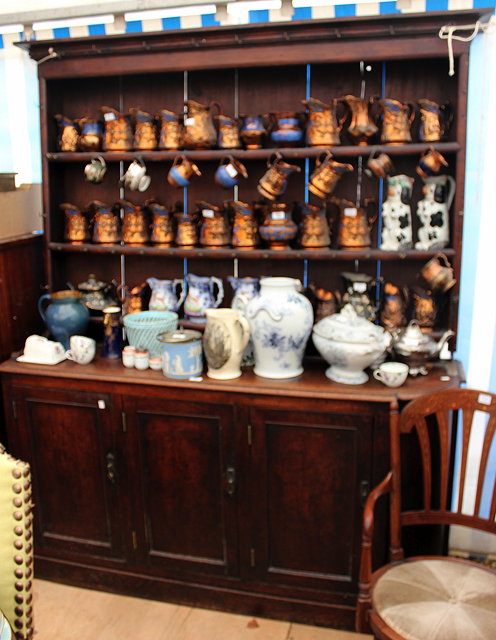 Appraisal: A GEORGIAN OAK DRESSER three tier plate rack above three