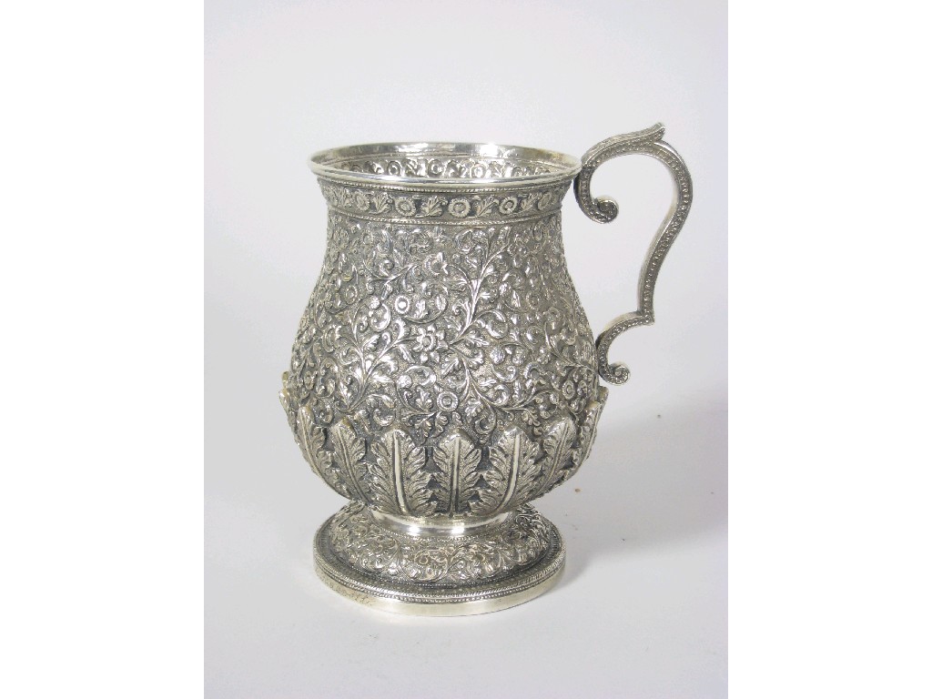 Appraisal: An Eastern silver Tankard scrollwork and leafage design inscribed inscription