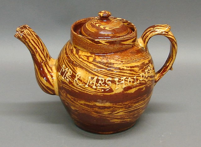 Appraisal: Globose form with spiral glaze inscribed on one side in