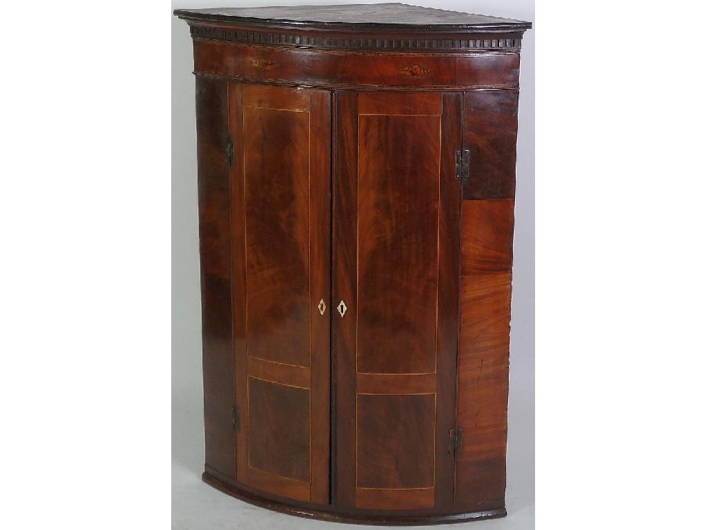 Appraisal: EARLY NINETEENTH CENTURY FIGURED MAHOGANY AND INLAID BOW FRONTED CORNER