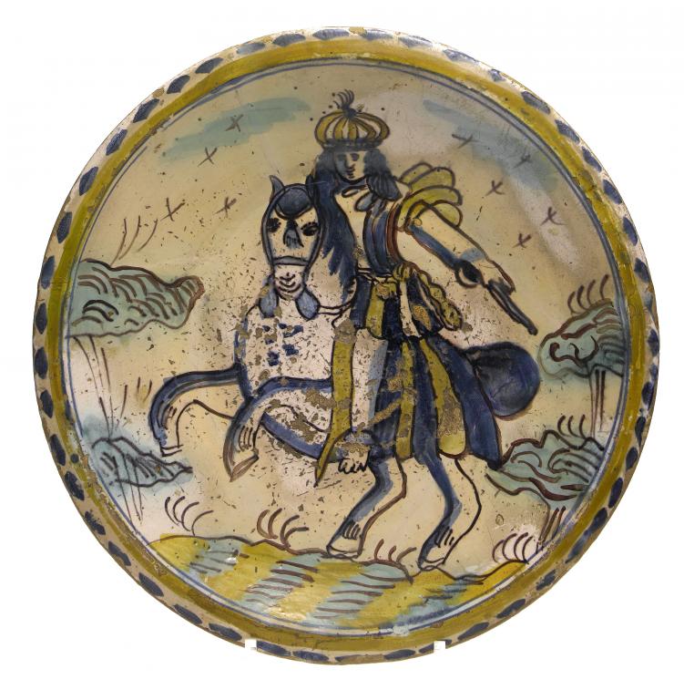 Appraisal: A DELFTWARE CHARGER PROBABLY LONDON painted in cobalt green and