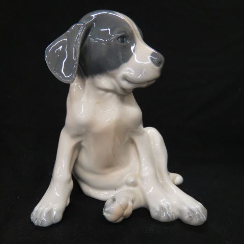 Appraisal: Royal Copenhagen Porcelain Figurine of aSeated Puppy excellent