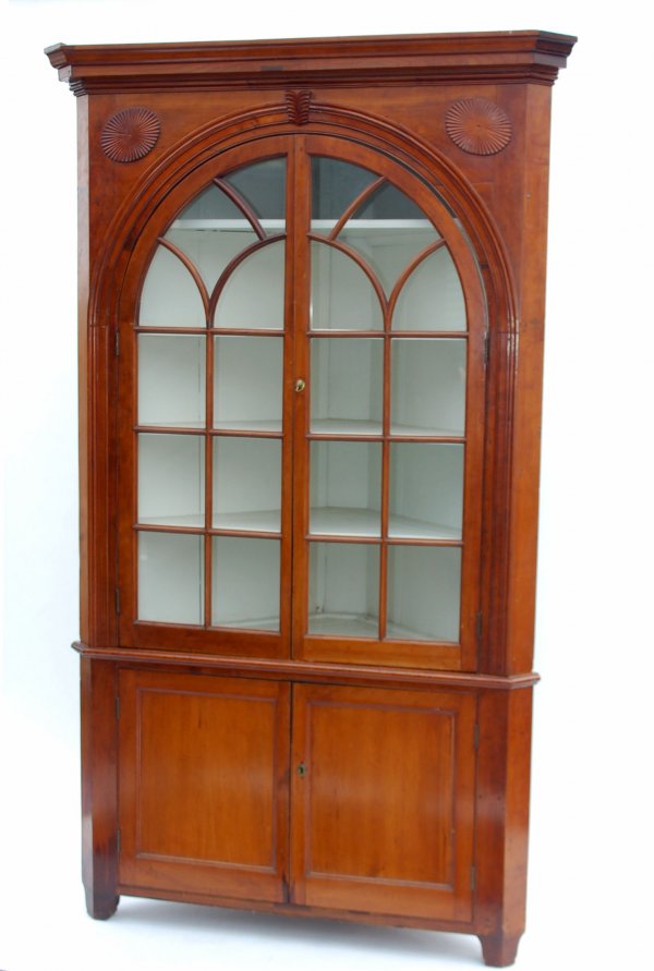 Appraisal: Corner cupboard Two part Paneled doors to bottom Brass eschutcheon