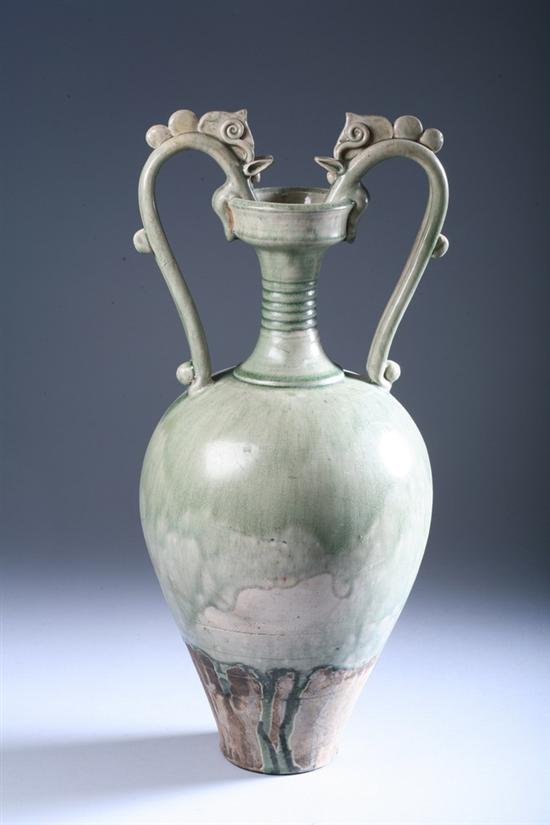 Appraisal: CHINESE GREEN GLAZED AMPHORA th century Molded in the Tang