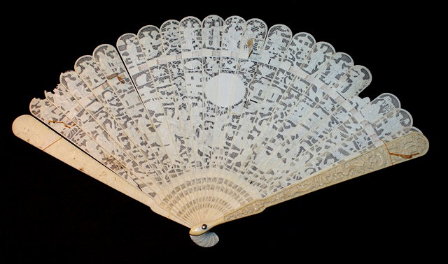 Appraisal: A CHINESE CANTON CARVED IVORY FAN the guards carved with