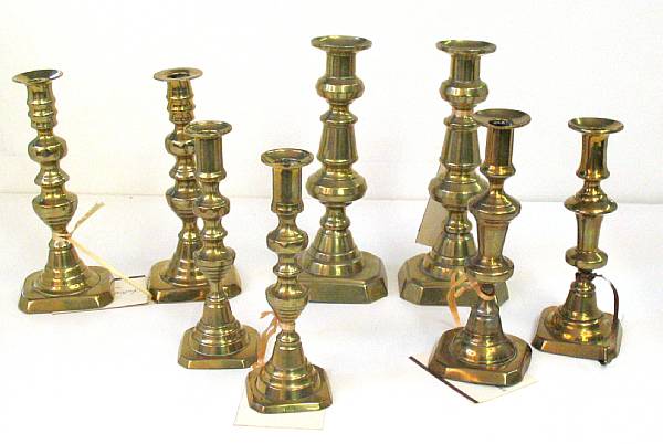 Appraisal: Three pairs of brass candlesticks and two singles th century