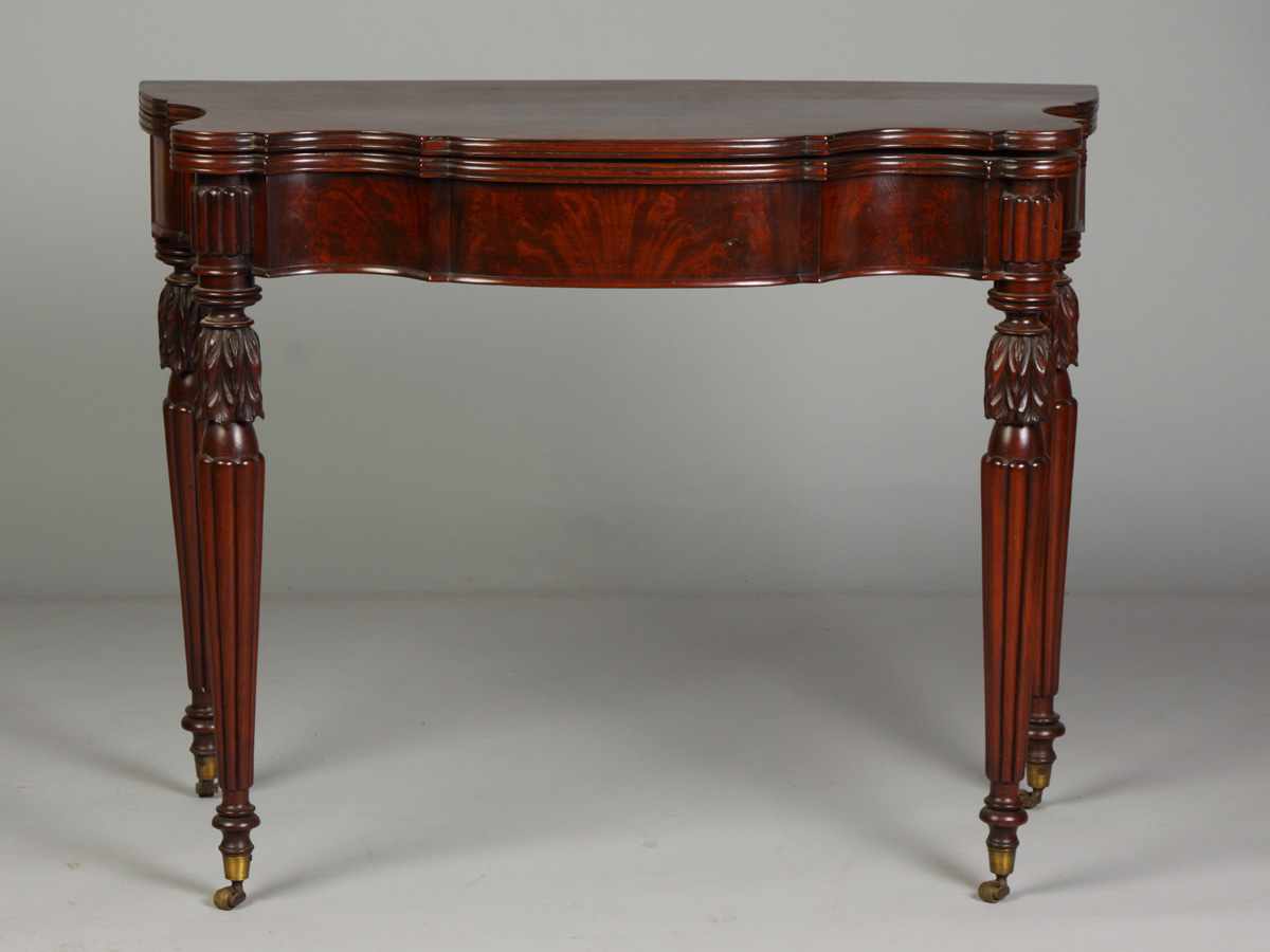 Appraisal: Mass Mahogany Serpentine Front Card Table Fluted carved legs on