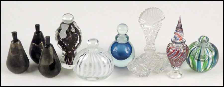 Appraisal: TWO ANDREW SHEA GLASS PERFUME BOTTLES Together with three Martha