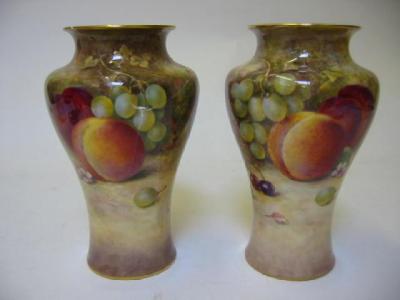 Appraisal: A PAIR OF ROYAL WORCESTER PORCELAIN VASES dated and of