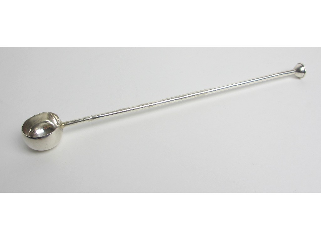 Appraisal: An Edwardian silver ladle the pierced stem with deep bowl