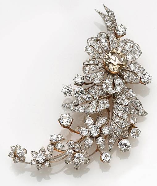 Appraisal: A late Victorian colored diamond diamond and platinum-topped flower brooch