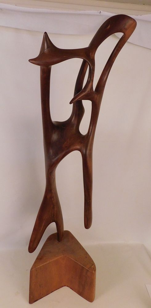 Appraisal: EUDOVIC MODERNIST WOOD SCULPTURE Large abstract carved wood floor sculpture