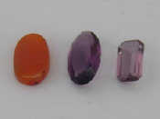 Appraisal: Loose stones including an oval cut amethyst x x a