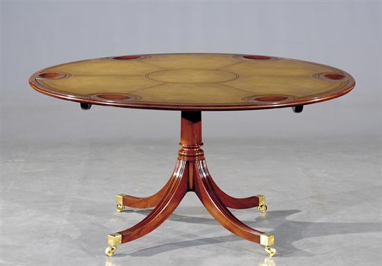 Appraisal: Regency style mahogany and leather tilt-top games table circular top