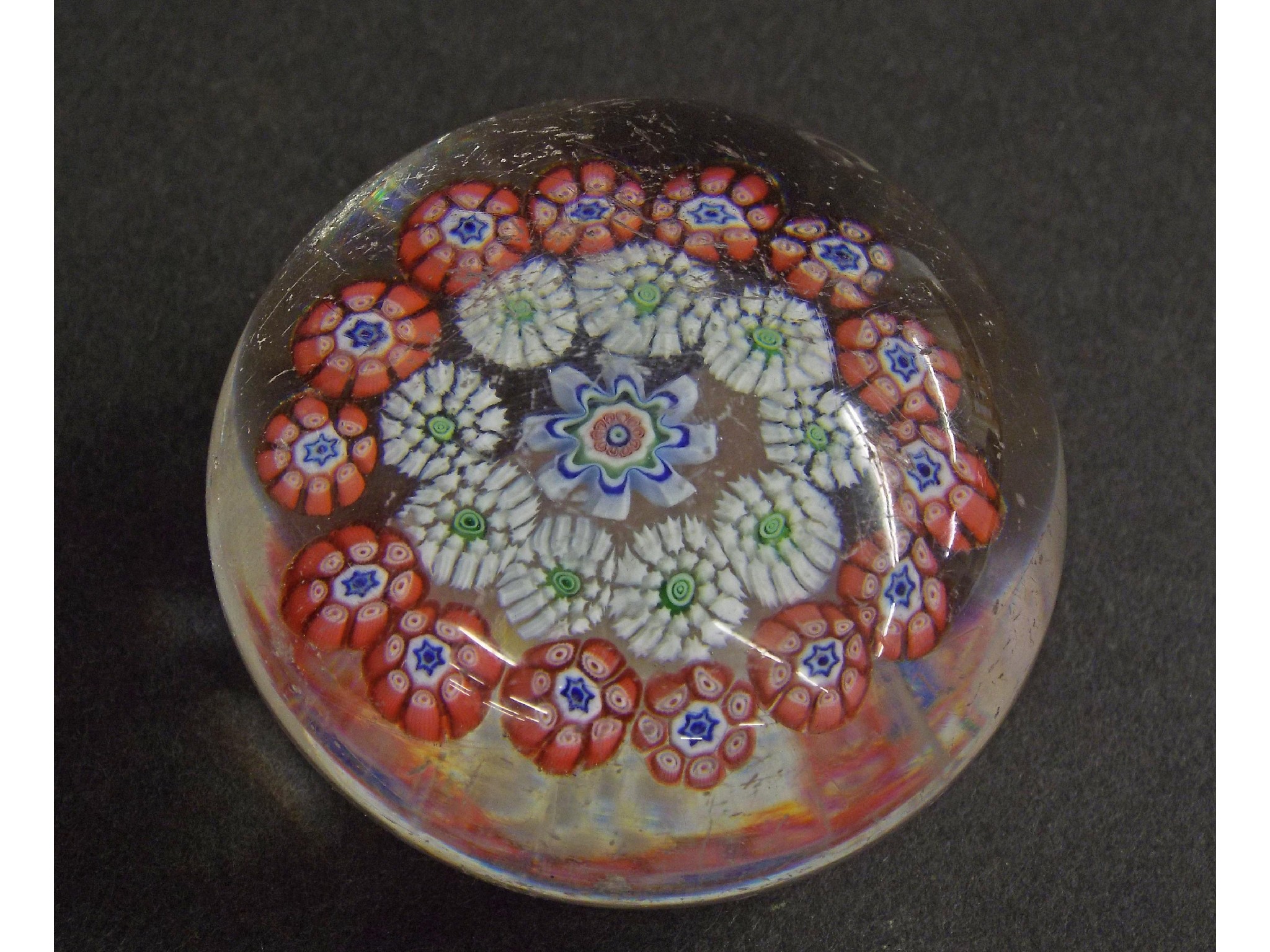 Appraisal: Baccarat glass paperweight decorated with blue pink and white canes