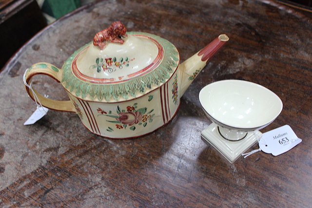 Appraisal: A CREAMWARE SALT on square stepped base cm wide together