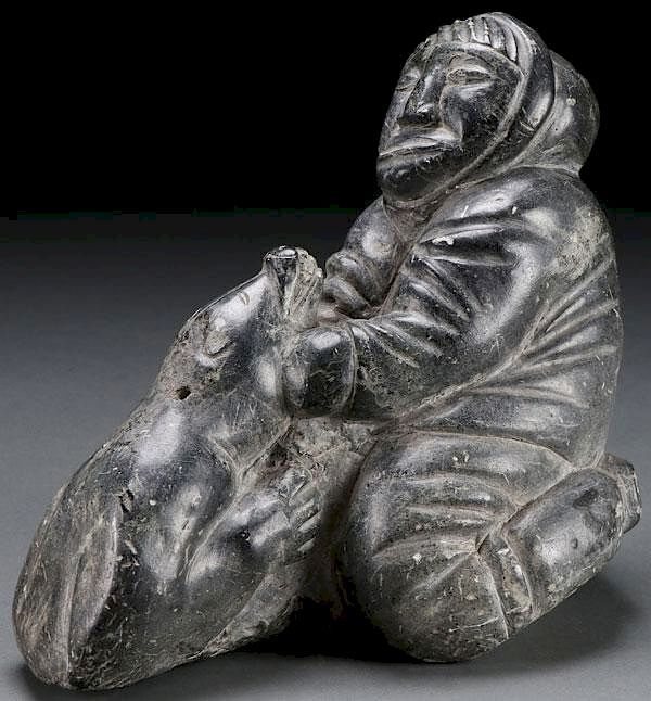 Appraisal: SOAPSTONE CARVED INUIT FIGURES A GROUP OF THREE SOAPSTONE CARVED