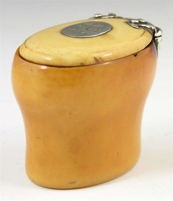 Appraisal: An ivory baluster snuff mull with a hinged cover having