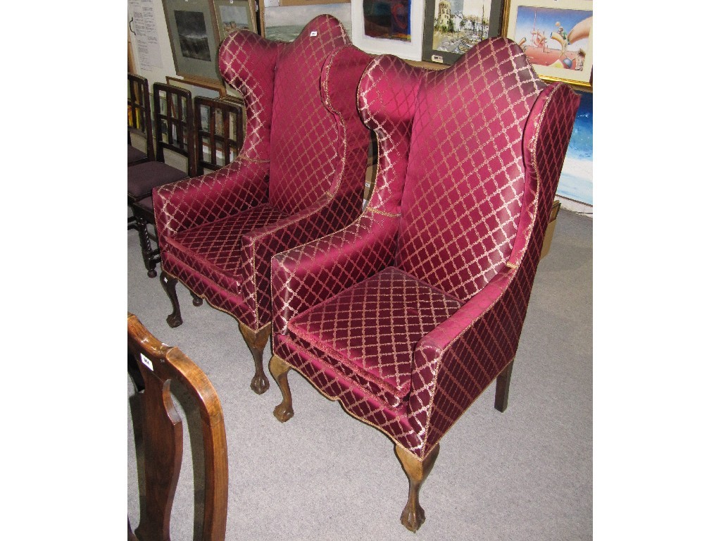 Appraisal: Pair of Edwardian trefoil top wing armchairs upholstered in red