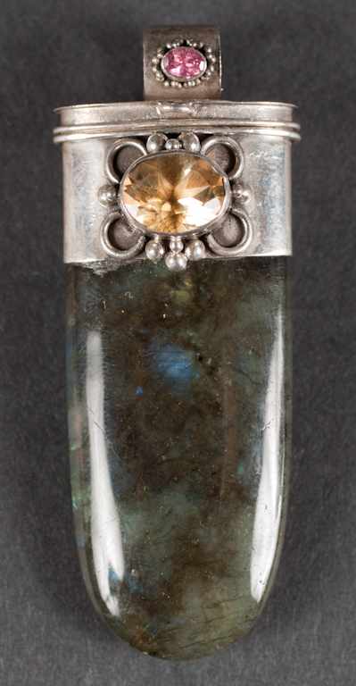 Appraisal: Silver labradorite and topaz poison pendant Estimate - We are