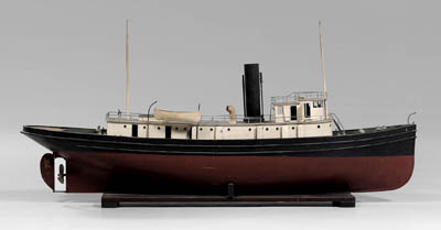 Appraisal: Steam-powered tug boat model painted wood with various brass iron