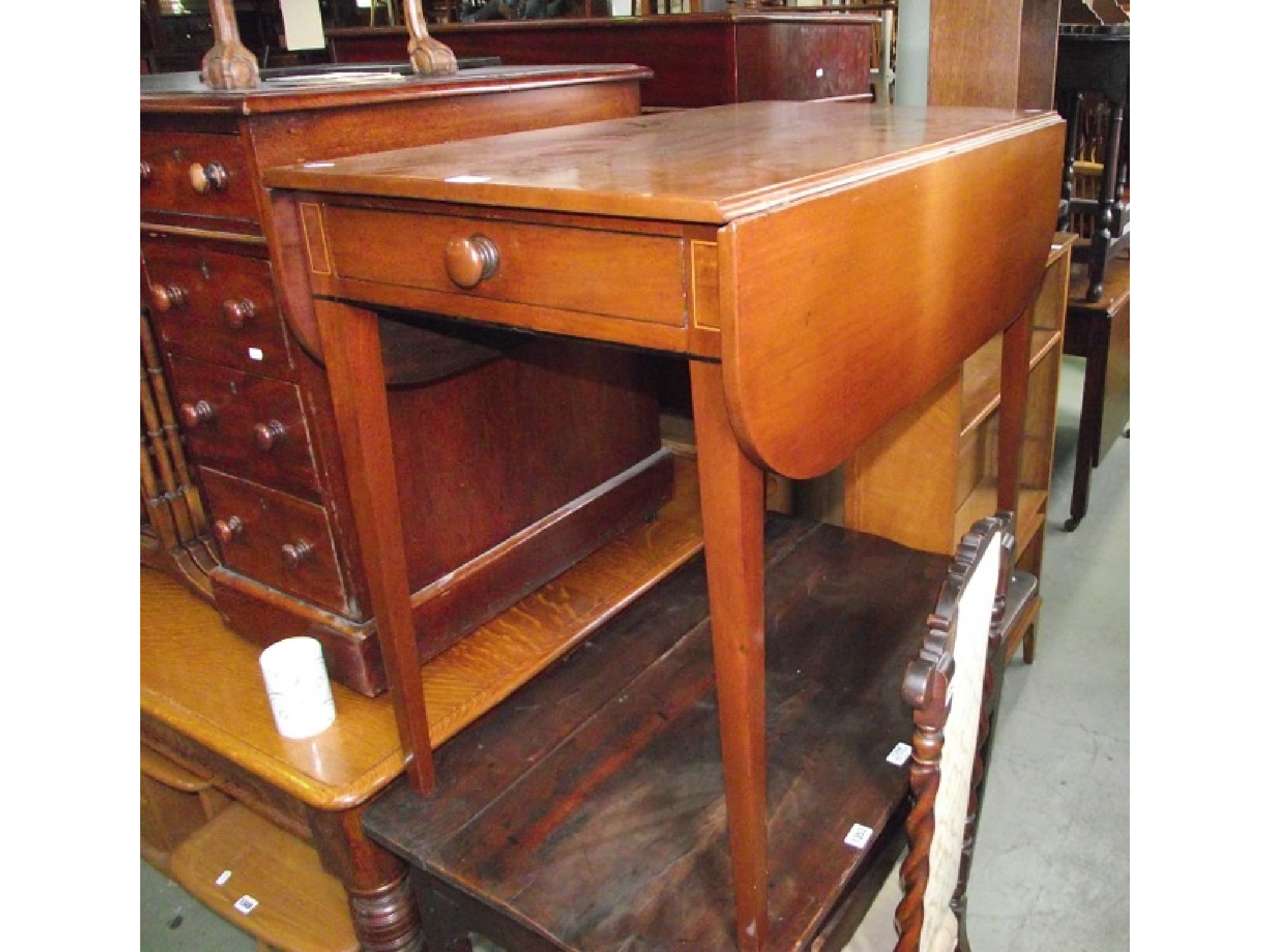 Appraisal: A th century mahogany Pembroke table with inlay detail and