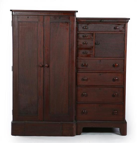 Appraisal: CHIFFEROBE American early th century mahogany Two-door wardrobe next to