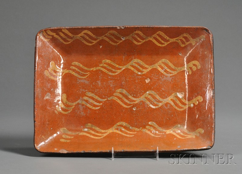 Appraisal: Slip-decorated Redware Pottery Loaf Dish America early th century rectangular