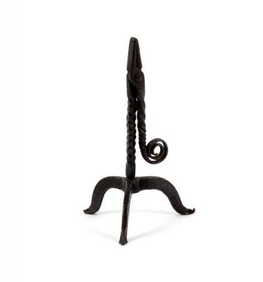 Appraisal: An th Century wrought iron rush-light holder with scroll termination