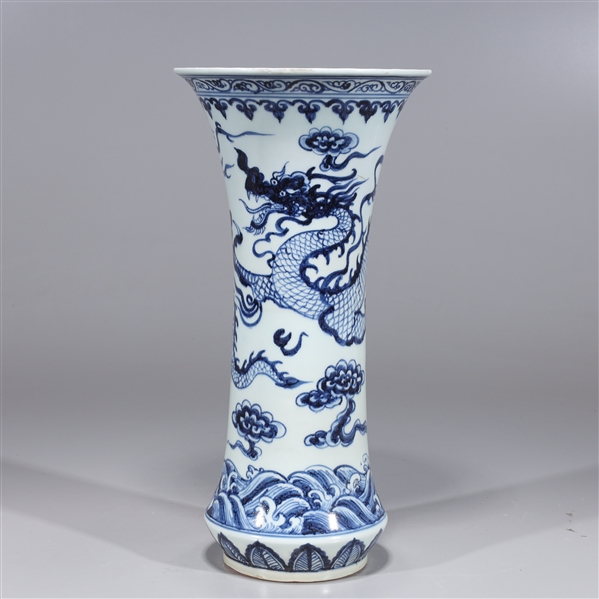 Appraisal: Chinese blue and white porcelain beaker vase with dragon chasing