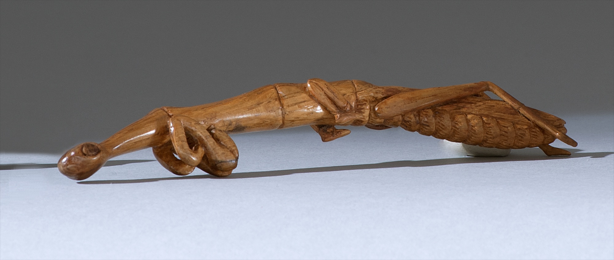 Appraisal: WOOD NETSUKE th CenturyBy William Shotts In the form of