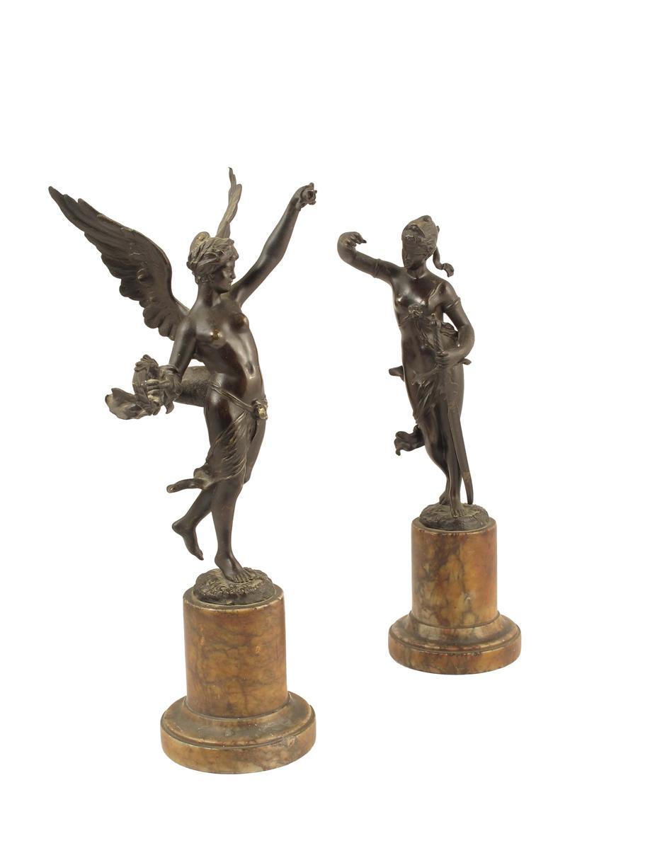 Appraisal: A pair of German bronze figures of Victory and Justice