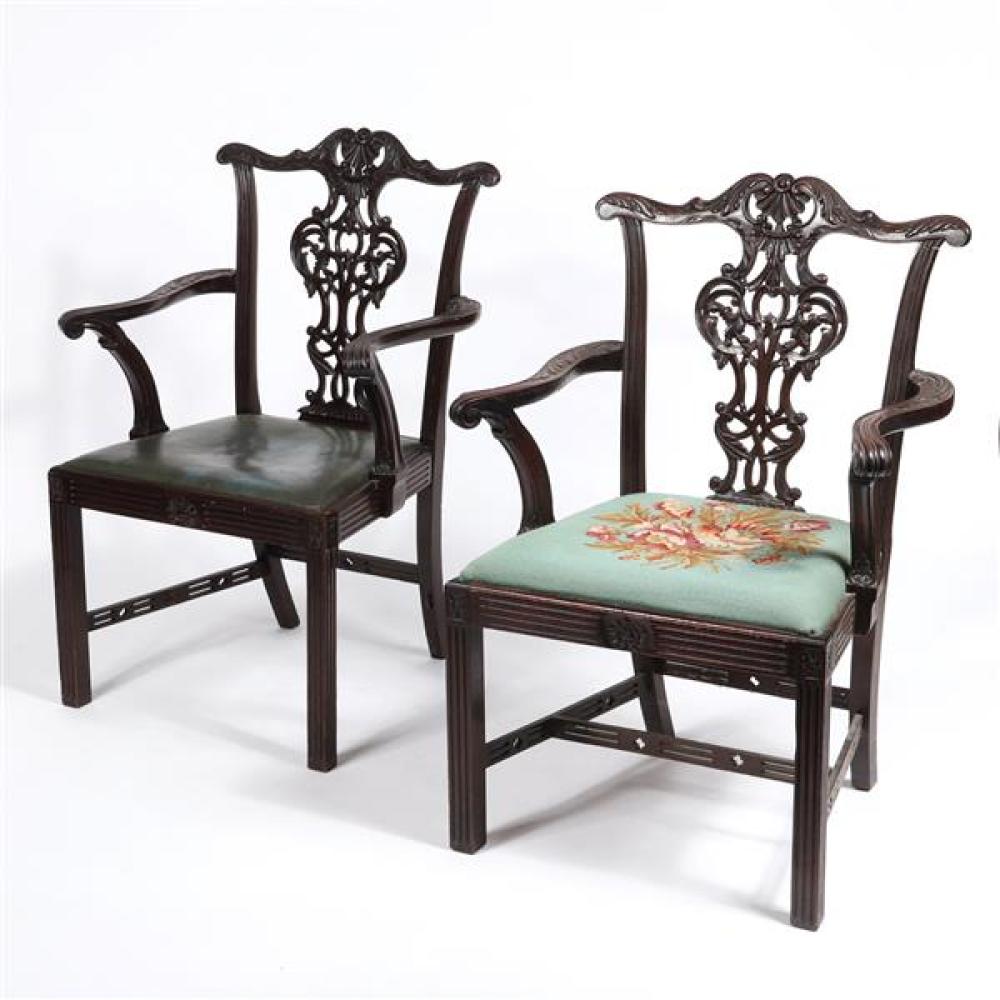 Appraisal: TWO CONTINENTAL CHINESE CHIPPENDALE STYLE ORNATELY CARVED ARM CHAIRS ONE